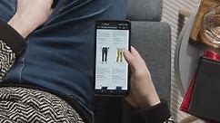 Overhead Shot Of Person At Home Shopping Online Looking At Macy's Website On Mobile Phone 1 Free Stock Video Footage Download Clips Business