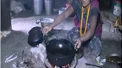 Nomad family cooking their food with primitive cooking technology