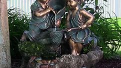 Boy and Girl Playing in Water Outdoor Water Fountain with LED Light by Sunnydaze Decor
