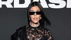 Kourtney Kardashian Poses in All-Leather & Lug-Sole Boots for Mirror Selfie in Her Closet