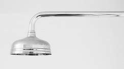 How to clean a shower head with vinegar to remove limescale