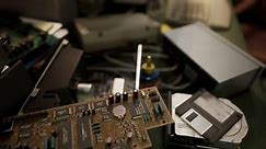 Free stock video - Old computer floppy disk and motherboard