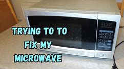 The door on my microwave oven won't open. Can I fix it.