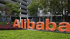 Alibaba’s shares slide below IPO price