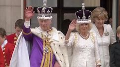 Moment newly-crowned King and Queen take centre-stage on balcony