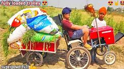 Homemade mini tractor pulling heavy loaded trolley with grass| DIY tractor |