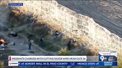 Video: Migrants damage border fence, get arrested