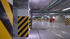 Empty underground parking garage. Cars