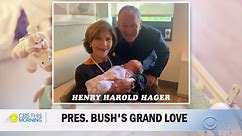 George W. Bush shows pictures of grandson
