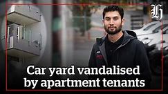 Car yard vandalised by apartment tenants