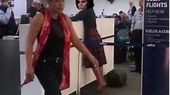 Nancy Pelosi arrives at the airport, ready for her trip to Brussels....