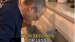 In 30 seconds (OR LESS) install a kitchen cabinet door with me (featuring Dave) 👷‍♀️🔨 #diyhack #diy #kitchenhack #kicheninspo #kitchenhack #kitchendiy #cabinetrefinishing #cabinetrefacing #interiorpainters #professionalpainters #paintersofinstagram #newportri #bristolri #ri #rhody #rhodeisland #portsmouthri #middletownri #beforeandafter | Cabinet Revival
