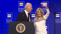 Jill arrives on stage to escort Joe Biden off at human rights event