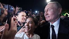 Russian TV shows Putin mobbed by residents of Derbent