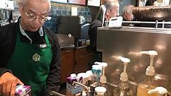 Starbucks worker back on the job one year after being wrongfully terminated