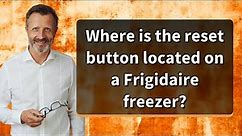 Where is the reset button located on a Frigidaire freezer?