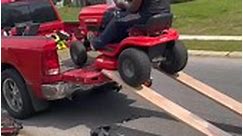 Unloading a mower off a truck without proper ramps