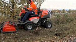 Husqvarna P 524 with flail mower in action