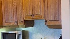 Orange oak kitchen makeover idea. Some of you asked if you could do a paint wash over the oak kitchen cabinets. The answer is yes, you can! I have to warn you it will be a lot of work. But you can get that look! #kitchen #kitchenmakeover #oakcabinets #oakkitchen #diy | Extreme Furniture Makeover