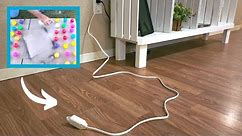 People are flipping out over this GENIUS living room cord idea!