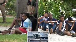 Migrants spotted climbing over backyard fences after smuggling boat lands in Florida