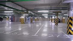 Empty underground parking garage. Cars