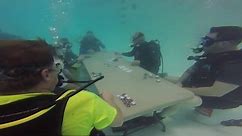 Underwater poker tournament