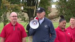 Biden visits UAW picket line, tells union to 'stick with it'