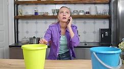 Worried Woman Calling Repair Service While Stock Footage Video (100% Royalty-free) 1083722365 | Shutterstock