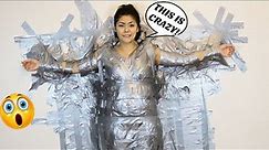 DUCT TAPE MY GIRLFRIEND TO THE WALL PRANK!!
