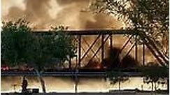 Bridge collapses on train causing massive fire in Arizona