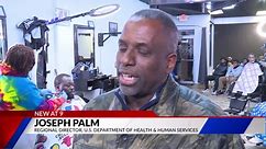 Community and police discuss domestic violence at barbershop