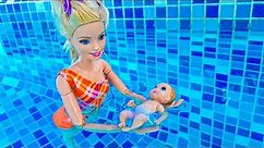 Barbie mom train to swim her baby doll in the swimming pool