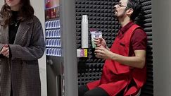 Man works in coffee vending machine