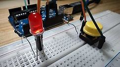 Using Simple Pushbutton Switches to Light Up LEDs