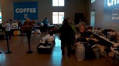 Tornado victims in Kentucky stock up on food and other essentials