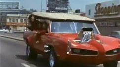 The Monkeemobile drives around town 1966-1967