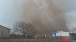 Tornado Debris Slams into Storm Chasers Vehicle