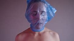 Woman Plastic Bag On Her Head Stock Footage Video (100% Royalty-free) 1022545342 | Shutterstock