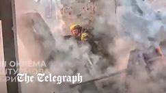 Ukrainian soldiers dive for cover as shells explode all around them near Bakhmut