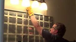 How to Remove a Glued Bathroom Mirror from the Wall