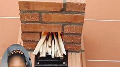 Outdoor wood stove with red brick and cement