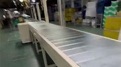 Slat Conveyor for assembly line.