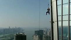 Watch: Window washers rescued from 57th floor