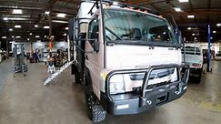 Four Wheel Pop-up Truck Camper - Grandby Flatbed Model on a FUSO