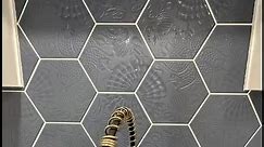 This is by far my favorite shower to date. I don’t use any metal edge trim on the alcove, shower corner or the curb. All mitered and epoxied. Envelope style pan with a large format tile set so the entire bathroom floor would transition seamlessly. The blue octagon texture tile backsplash with the waterfall courner tops and breakfast bar go perfect with these floors. I lI’ve this house. It will be listed for sale soon 3/2 in Metairie. More photos coming soon. | WDS Renovations LLC