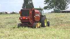 Farm Tractor With Round Baler