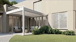 Aluminum pergola with louvered roof attached to the house