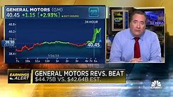 General Motors raises full-year guidance, announces deeper cost cuts