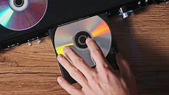 Loading Compact Disc into the CD Player Stock Footage - Video of electronic, disc: 305888586